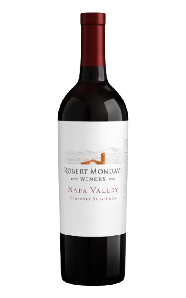 A wine bottle with a red cap stands upright. The label reads:
