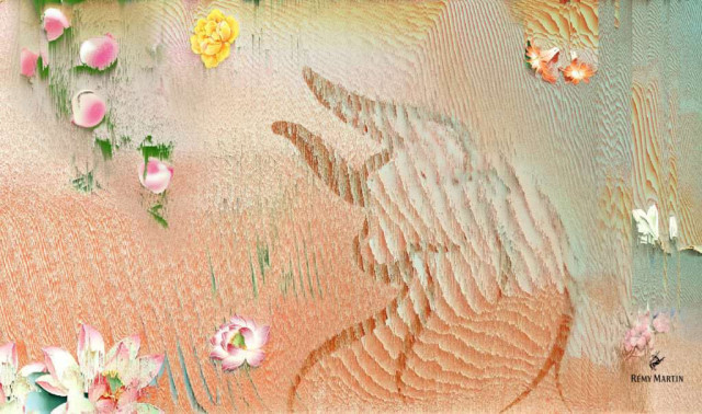 A sand-textured hand outlines the gesture of two fingers pointing, surrounded by scattered, colorful flower petals on a wavy, pastel background