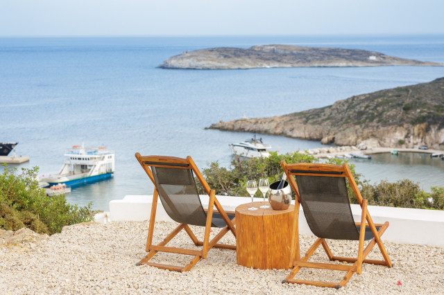 Ocean view, two lounge chairs.