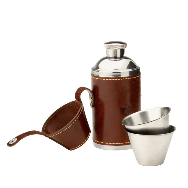 Steel flask with leather cover and cups.