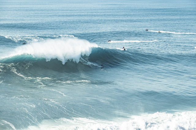 Surfing big waves in Cascais