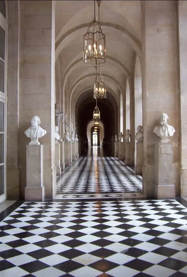 Elegant hallway, checkered floor.