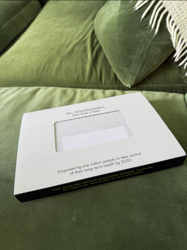 picture of blood test on green velvet sofa 