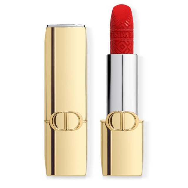 Red lipstick with gold-accented casing.