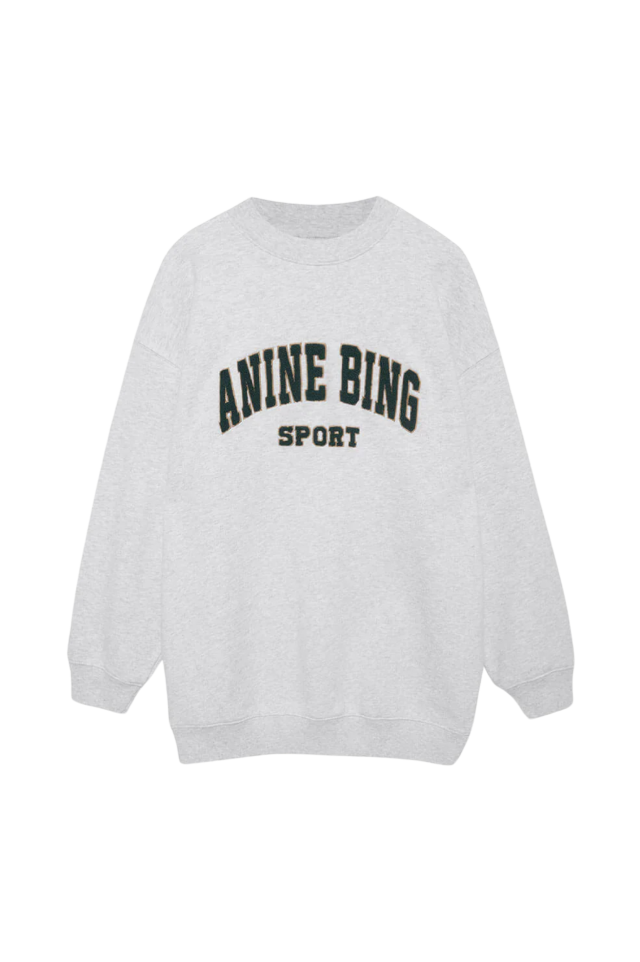 A light gray sweatshirt with black text reading