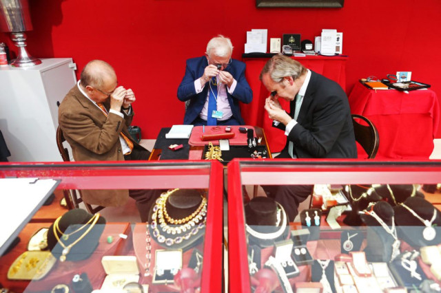 Event exhibitors get ready for the opening of the Art & Antiques Fair