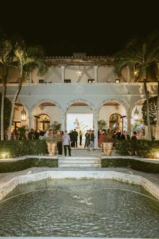 Nighttime party, grand estate.