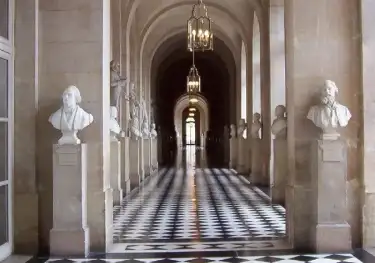 Elegant hallway, checkered floor.