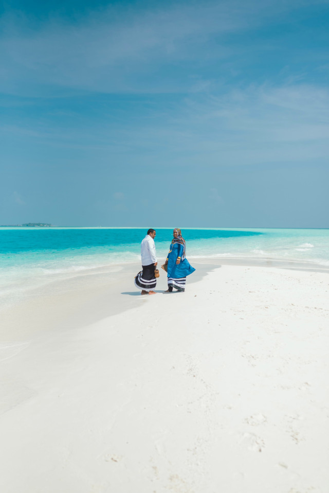 People Dressed in Traditional Maldivian Attire