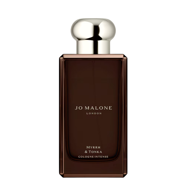 A rectangular, dark brown glass perfume bottle with a shiny, rounded silver cap. The front text reads: 