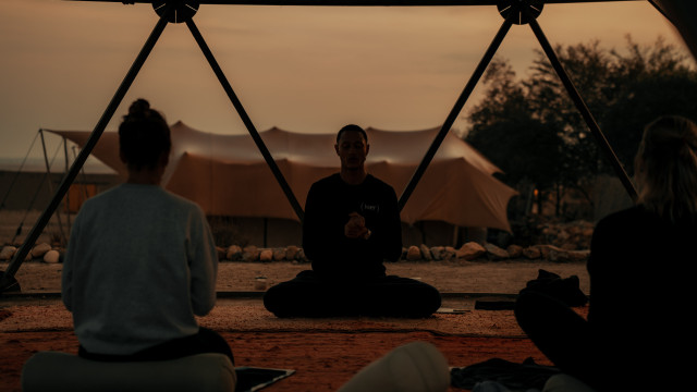 Sunset desert yoga session.