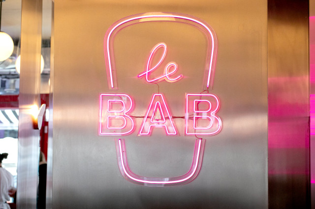 Pink neon sign reading 