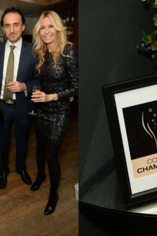 Framed Comité Champagne logo near people holding flutes.