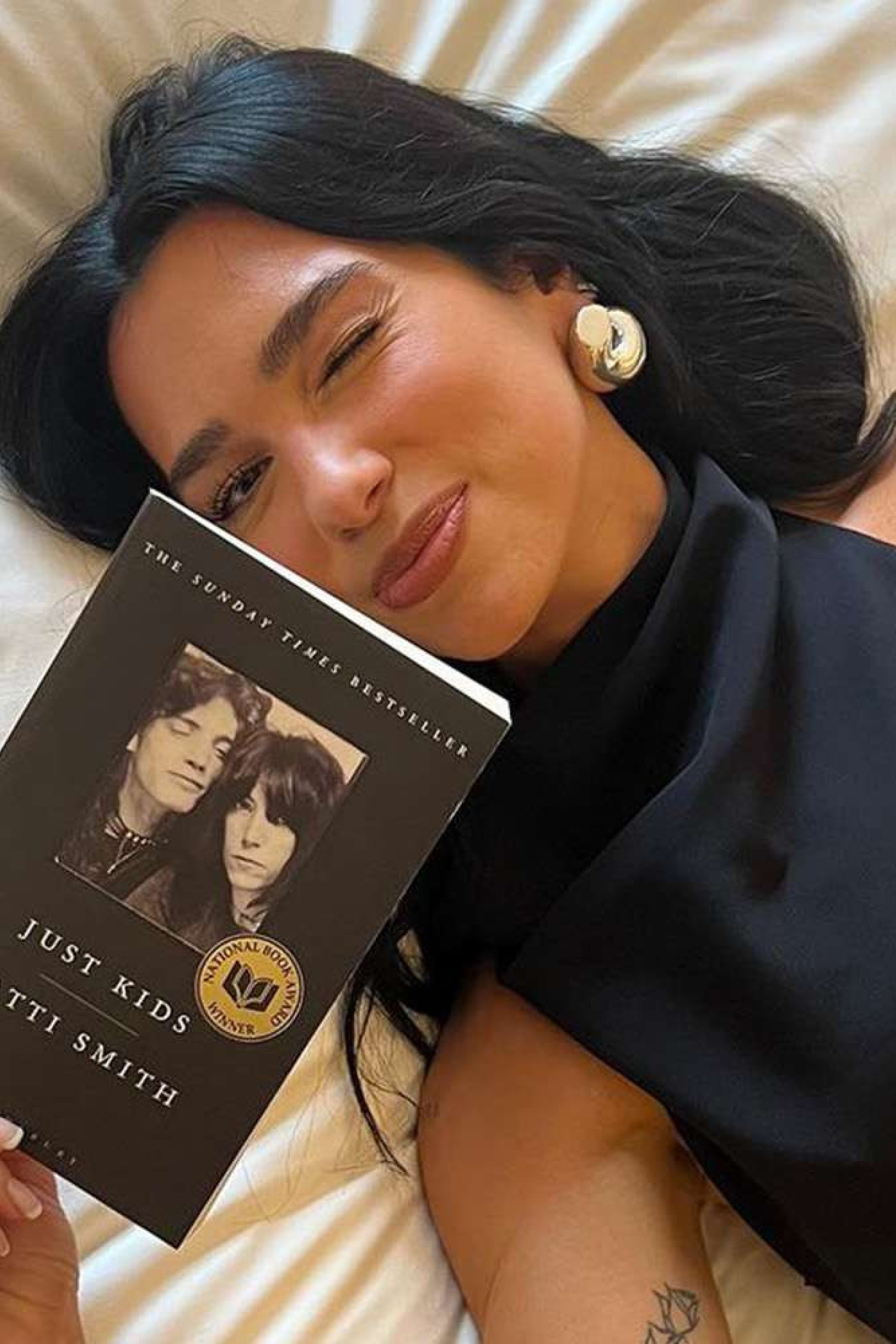 dua-lipa-service95-patti-smith-bookclub-instagram-082223-3bd7e6a5a88c49528abff79033e300d8.jpeg