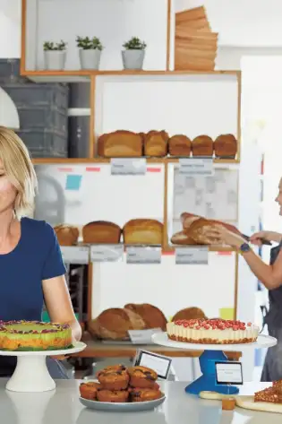 Melissa and lindsay in the modern baker cafe photography credit laura edwards e1519914109370.