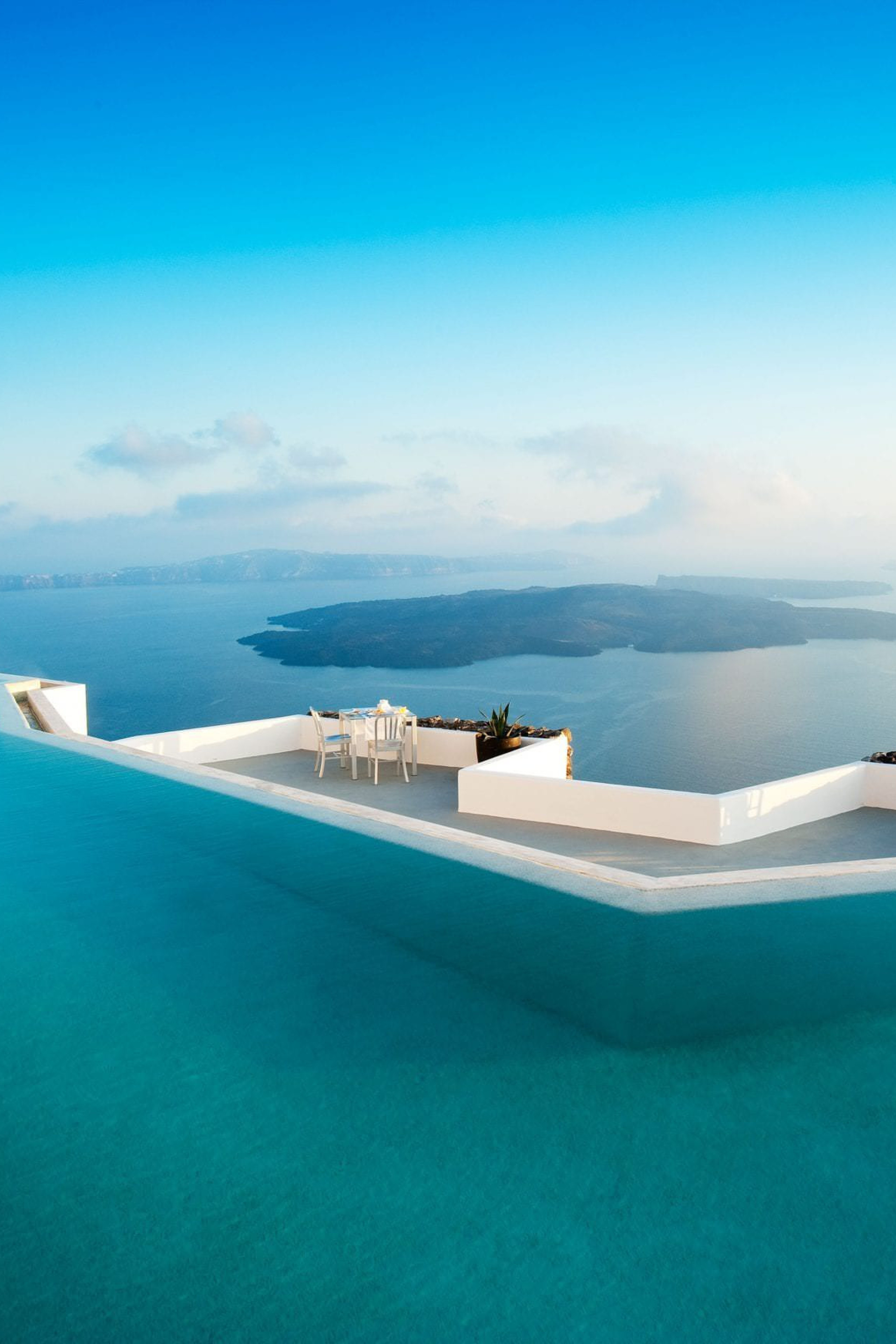 santorini-modernity---grace-hotel,-an-auberge-resorts-collection-outside-sea-beach.jpeg