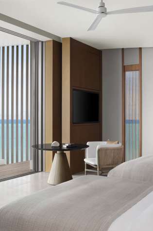 The ritz carlton maldives, fari islands   two bedroom overwater villa   twin bedroom.