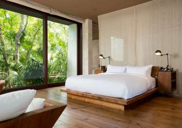 The sanctuary main house suite at como parrot cay.