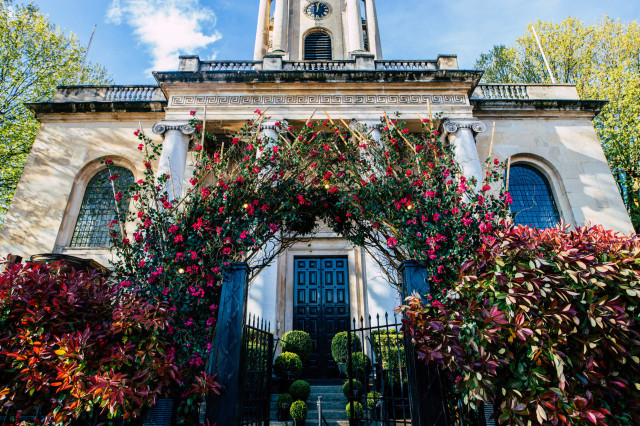 Church entrance with a floral archway.