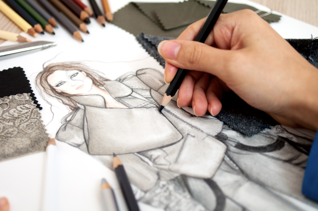 Fashion designer crafting new designs