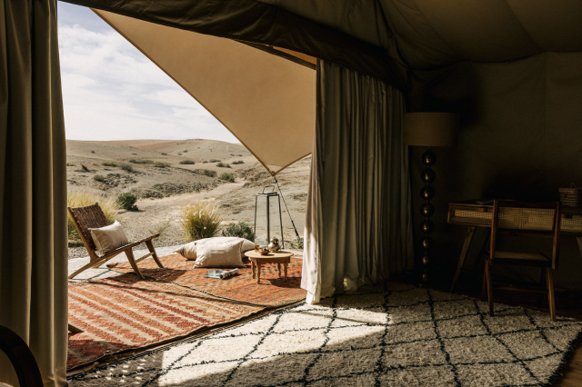 Luxurious tent with desert view.